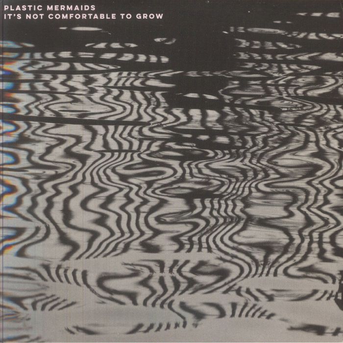 It's Not Comfortable To Grow - Black and Silver Splatter Vinyl LP vinyl record cover