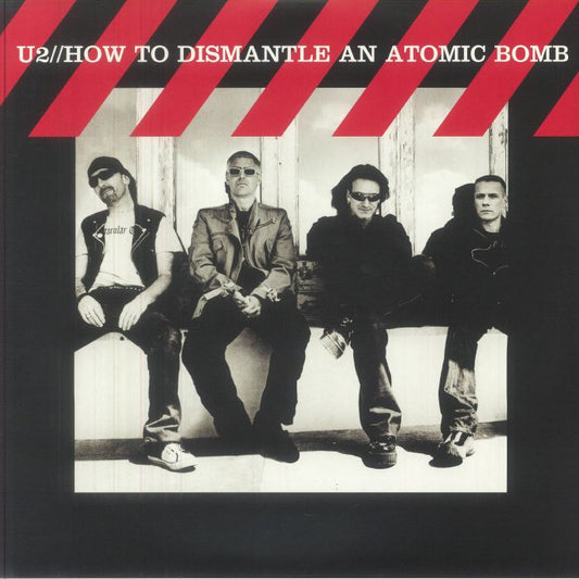 How To Dismantle An Atomic Bomb (20th Anniversary Edition) - Black & Red Vinyl 2xLP vinyl record cover